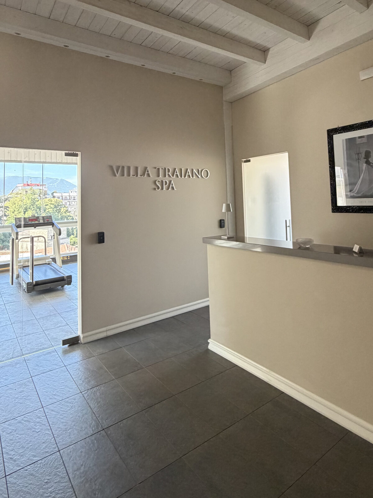 Villa Traiano SPA reception with the door to the panoramic Fitness Center